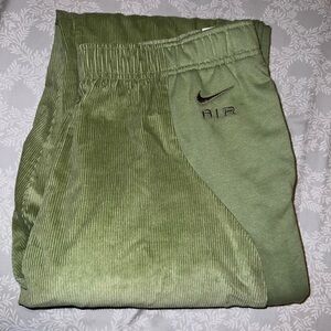 green Nike joggers